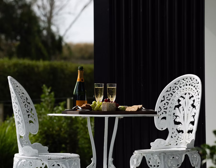 Wine and a cheese board on the Campbell Cottage veranda